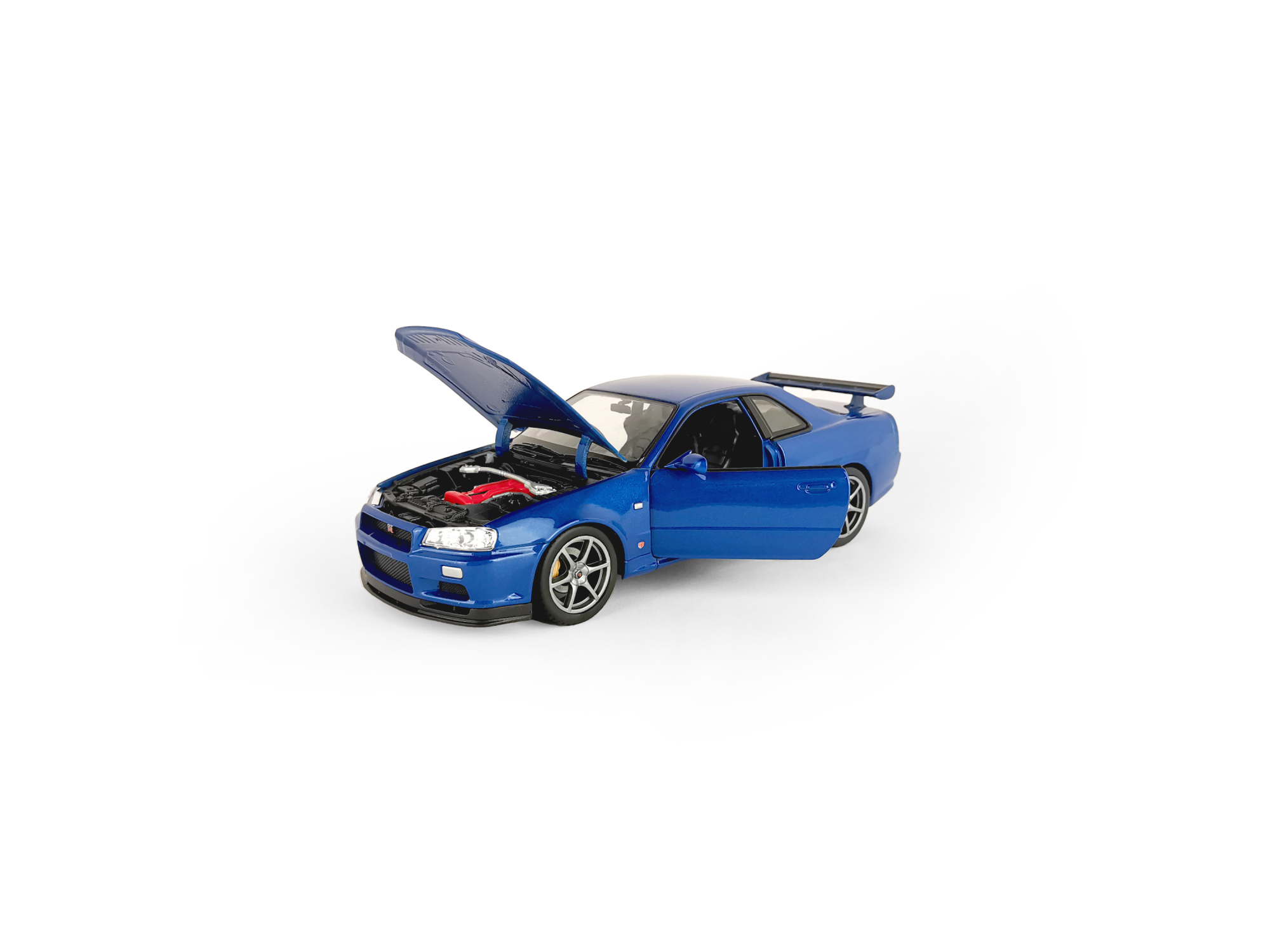 Машинка WELLY 1:24 Nissan Skyline GT-R R34, синий