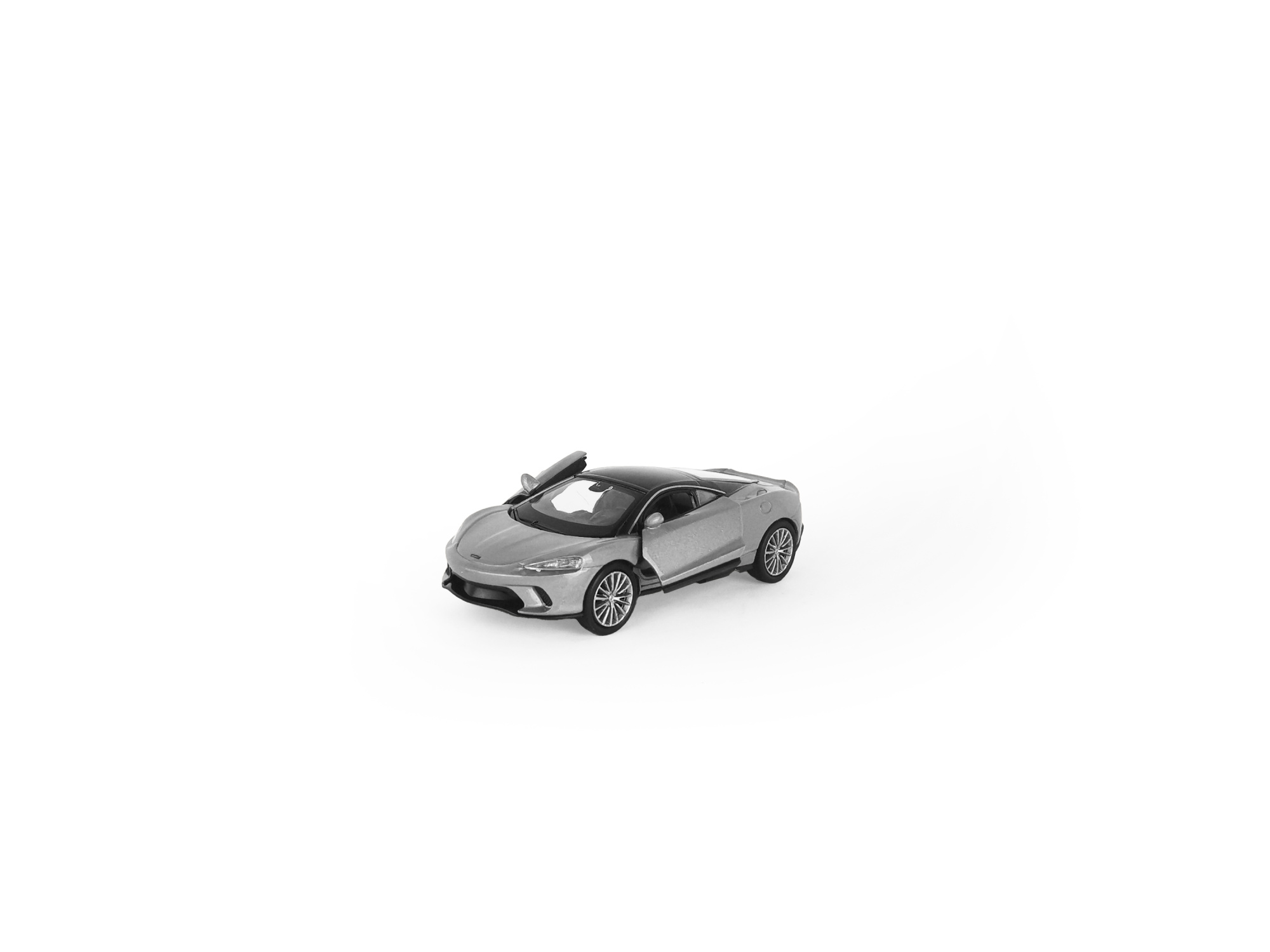 Машинка WELLY 1:38 McLaren GT, пруж. мех., цв. в асс. Машинка WELLY 1:38 McLaren GT, пруж. мех., цв. в асс.