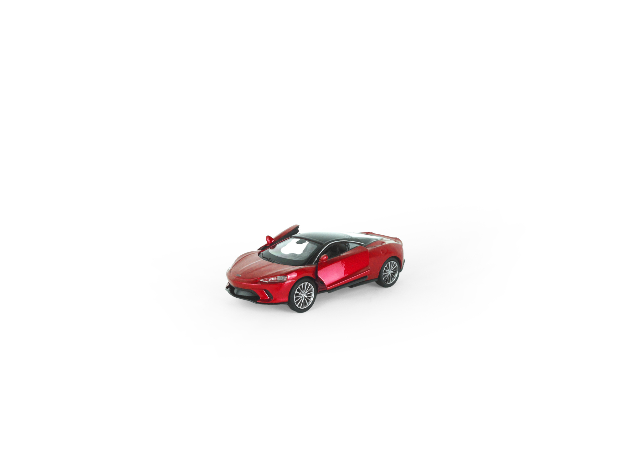 Машинка WELLY 1:38 McLaren GT, пруж. мех., цв. в асс. Машинка WELLY 1:38 McLaren GT, пруж. мех., цв. в асс.