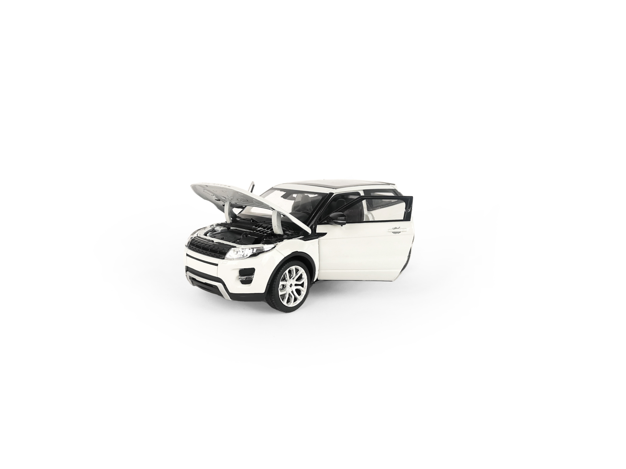 Машинка WELLY 1:24 Range Rover Evoque, белый Машинка WELLY 1:24 Range Rover Evoque, белый