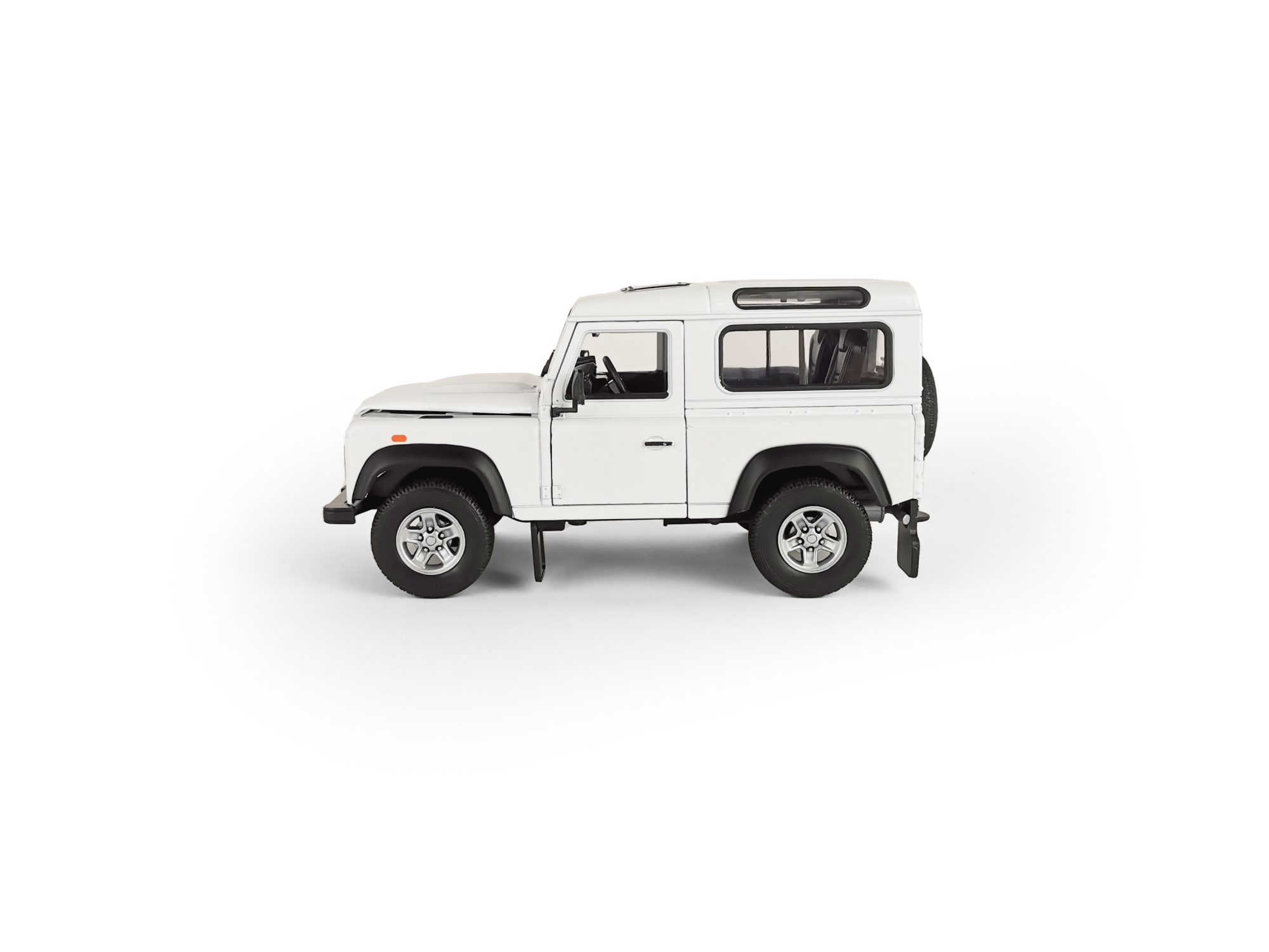Машинка WELLY 1:24 Land Rover Defender I, белый